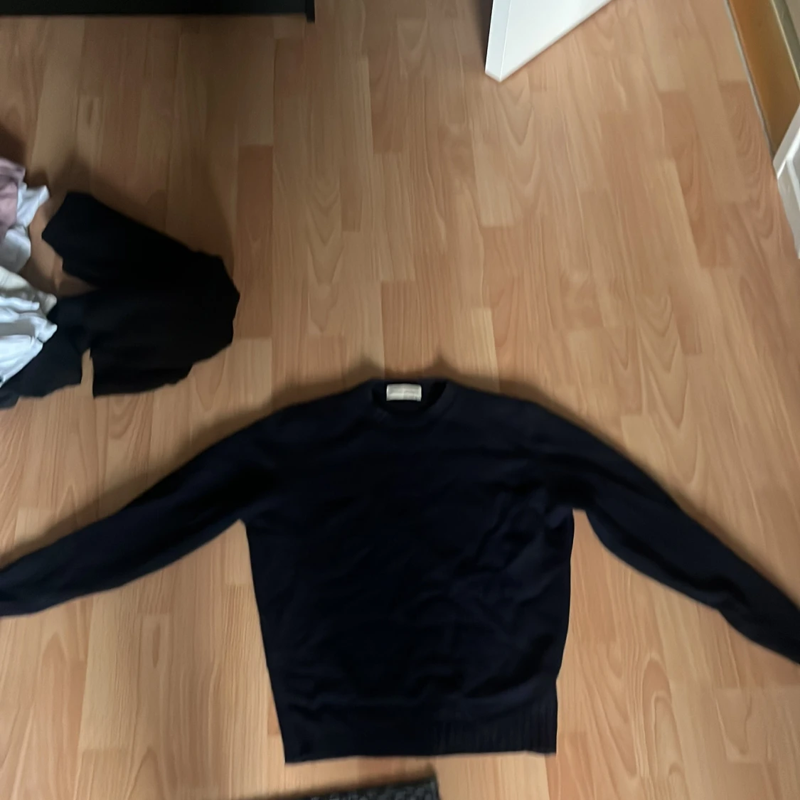 Mörkblå stickad tröja Studio de L'Artisan