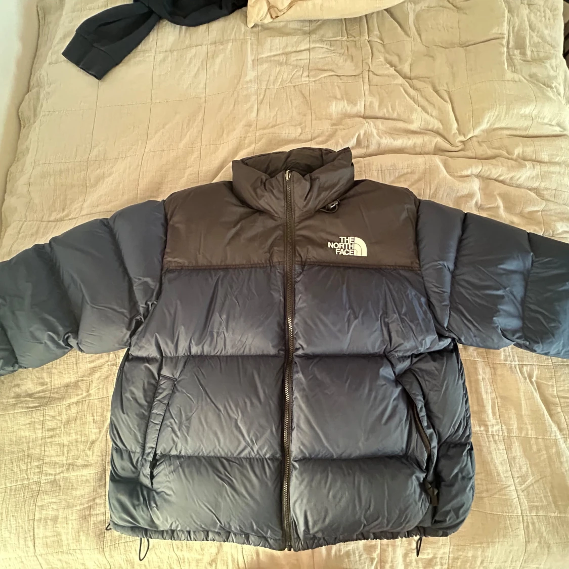 Blå dunjacka från The North Face