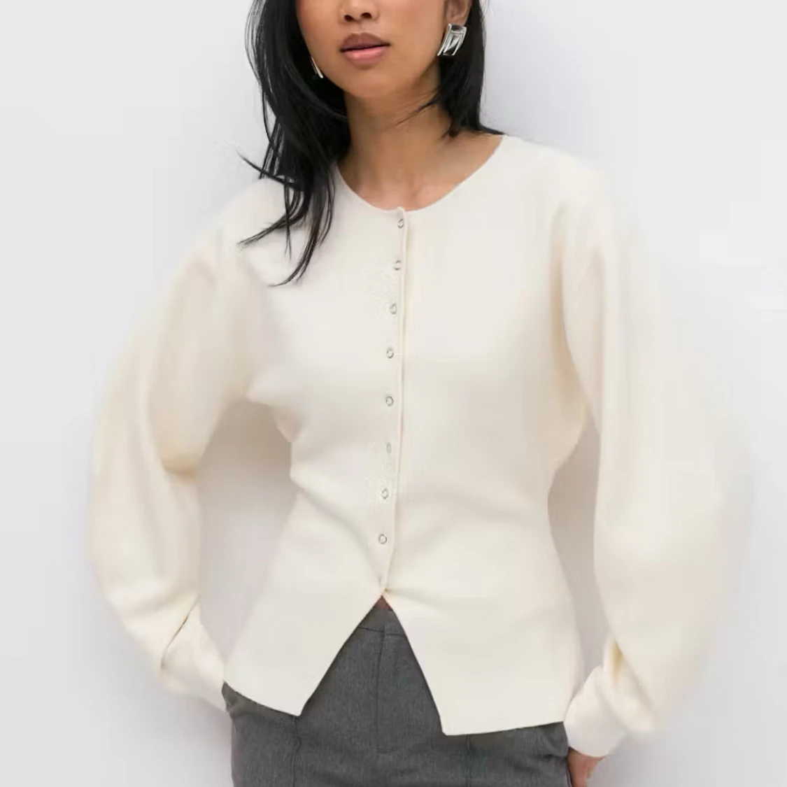 Beige kofta från Gina Tricot