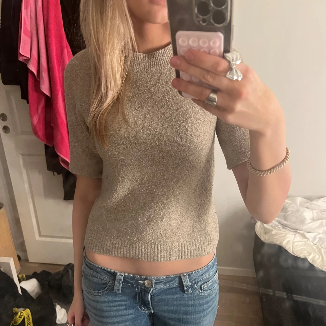 Stickad kortärmad tröja