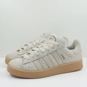 Adidas Campus 00s Putty Grey Charcoal (W) - Size: EU 40 2/3 Condition: Good Box: Original Box Color: Grey/Gum Article Nr: IH2660 Release Year: 2024
