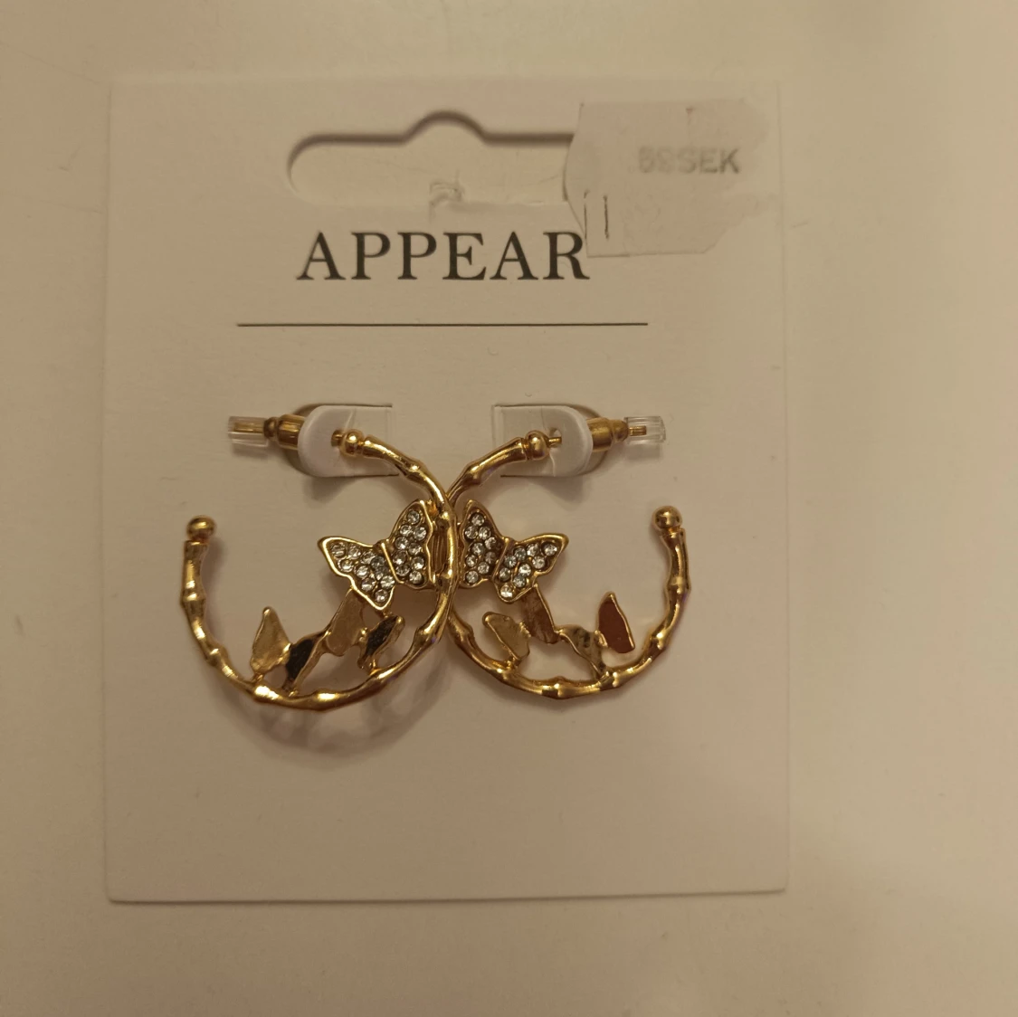 Guldiga örhängen  - 1