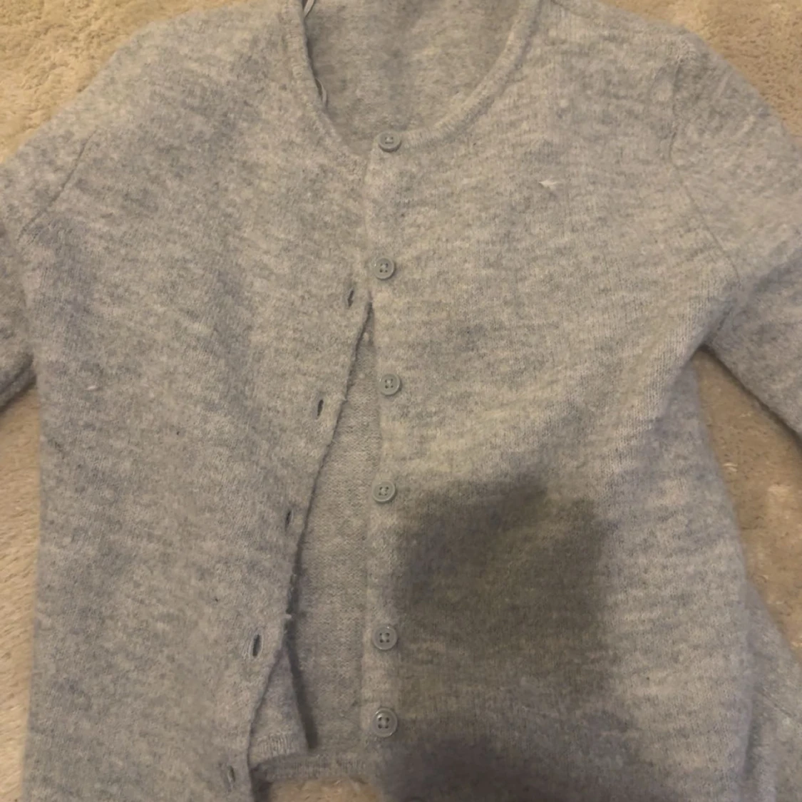 Ljusgrå kofta från Gina Tricot