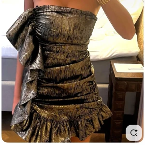 Zara ruffle dress - Popular Zara dress, not sold in store anymore. Great for events or party’s. Dark goldish ruffle dress. Thight fit!
