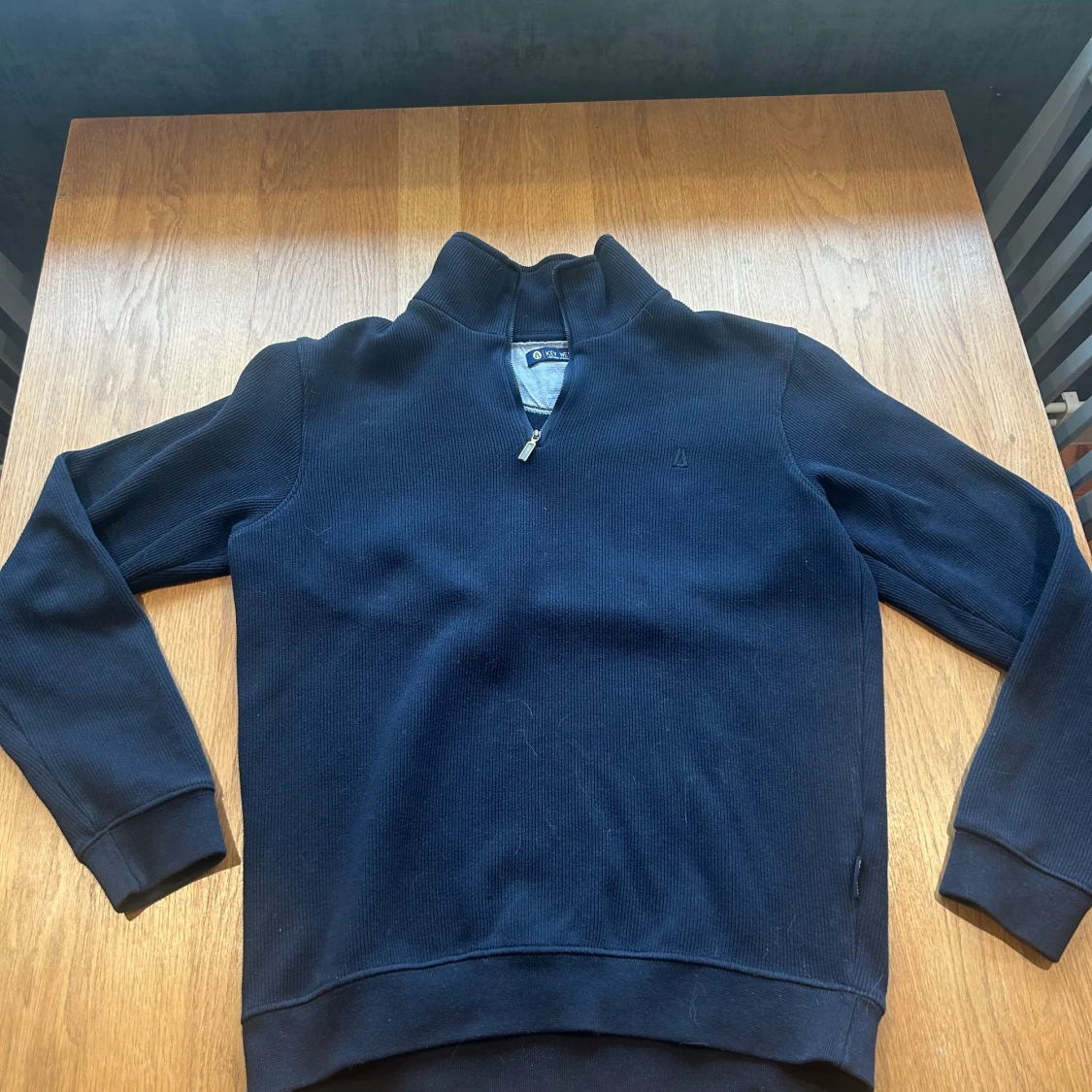 Mörkblå tröja med halv dragkedja från Key West