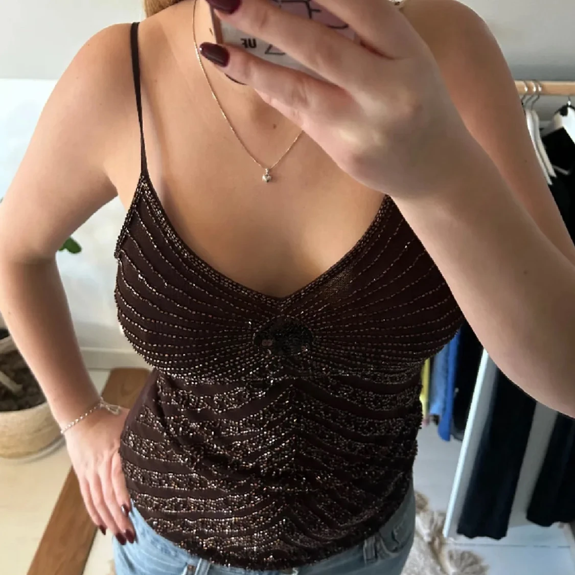 Brun glittrig linnetopp 