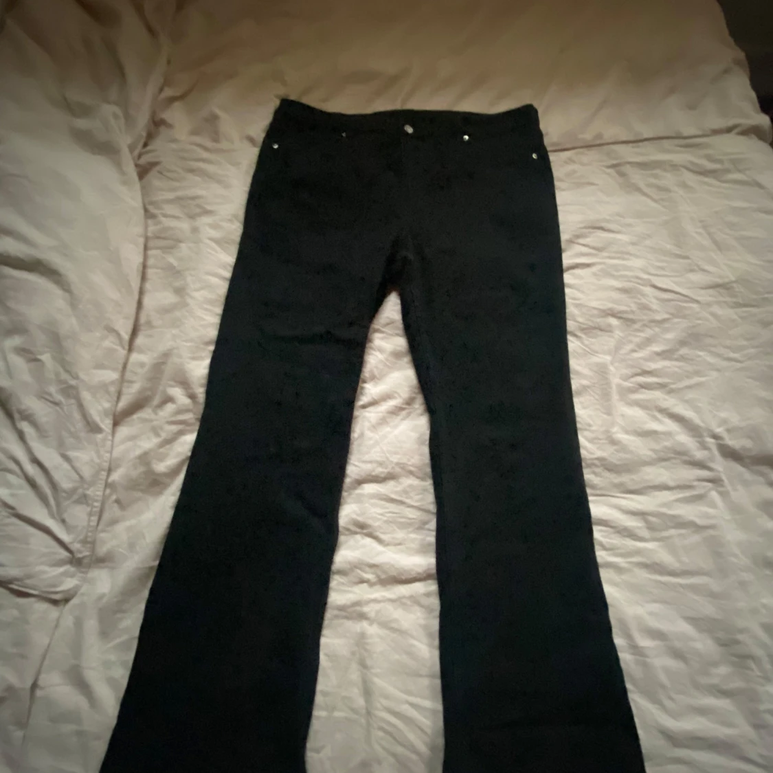 Svarta bootcut byxor