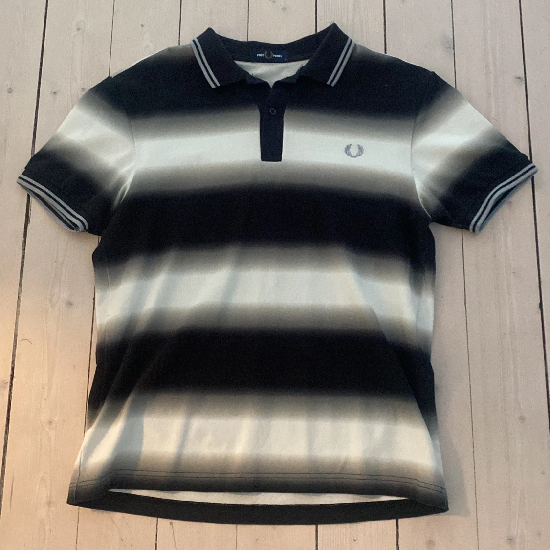 Randig pikétröja från Fred Perry