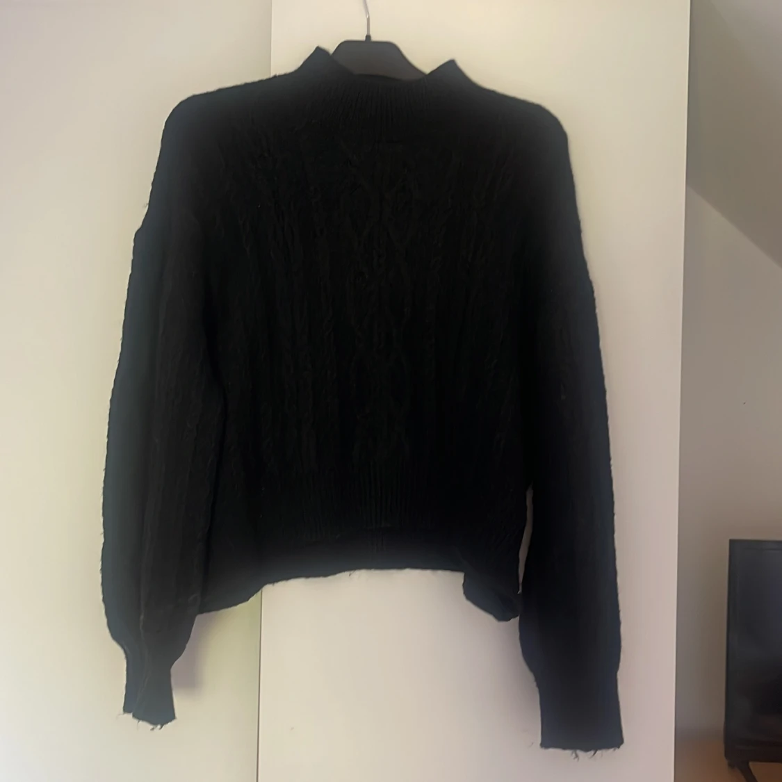 Svart stickad tröja från Samsa Collection