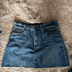 Jeanskjol från KappAhl - Blå jeanskjol storlek xs