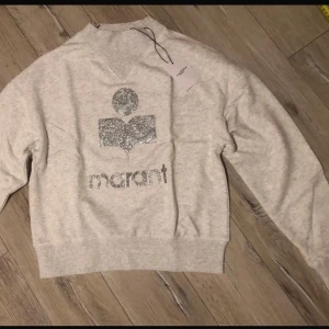 Isabel marant sweatshirt - Såå snygg och i nyskick knappt använd har kavr lappar separat men knte fast på tröjan