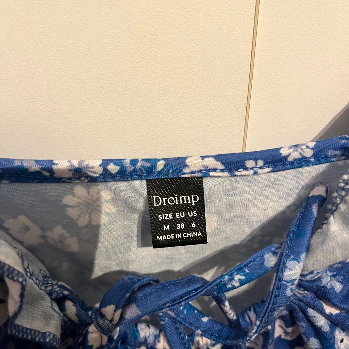 Blå blommig klänning från Dreimp - 90