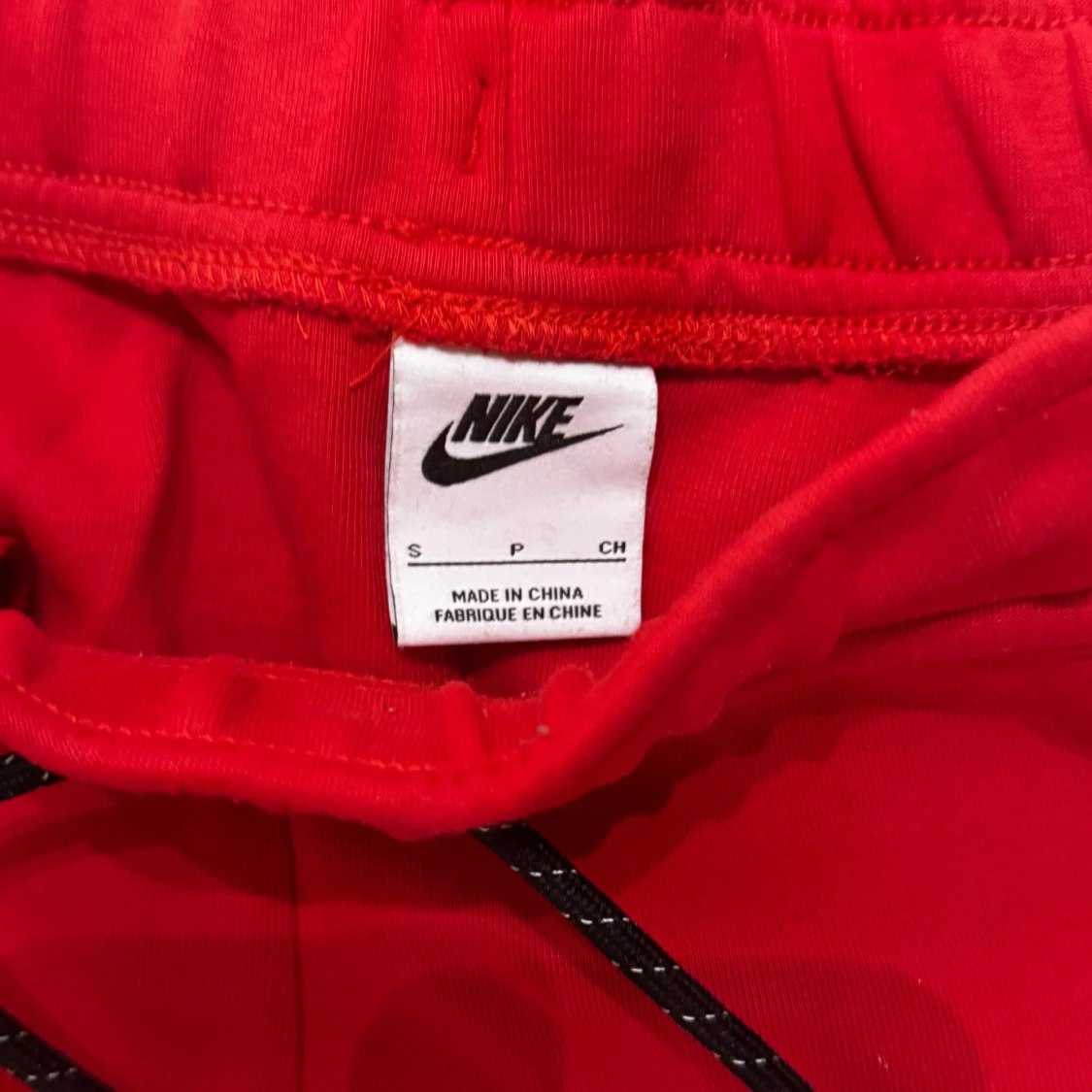 Röd Nike tech  - 90