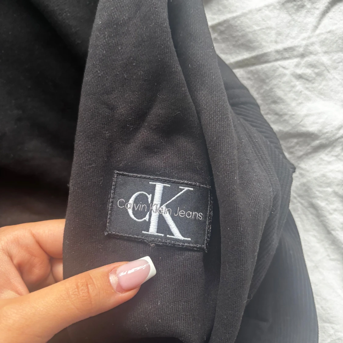 Svart hoodie från Calvin Klein Jeans - 1