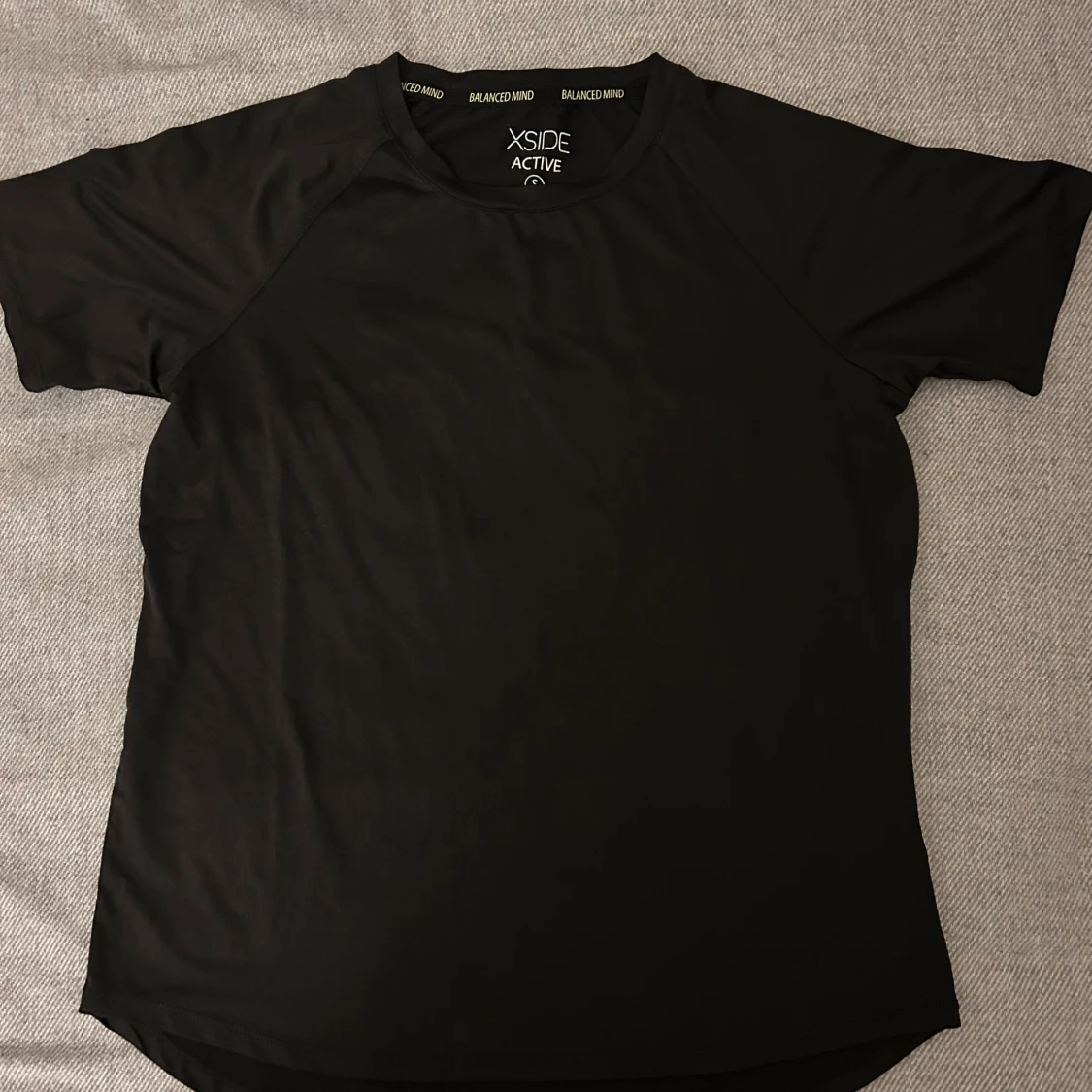 Svart t-shirt från Xside Active