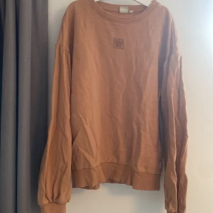 Tjocktröja - Orange tjocktröja