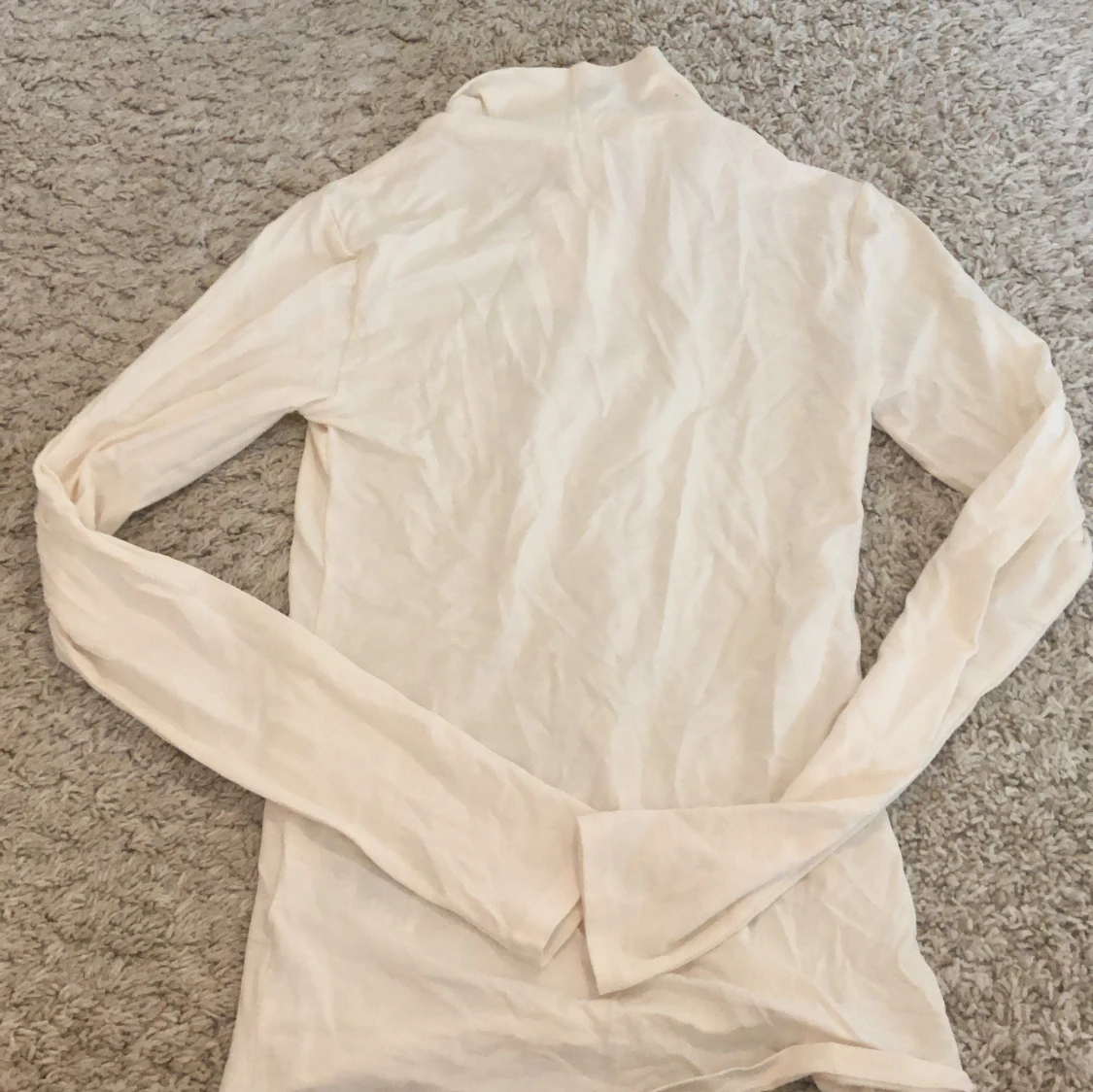 Vit polotröja från H&M