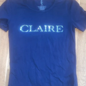 Claire tröja - Glittrig Claire tröja i svart