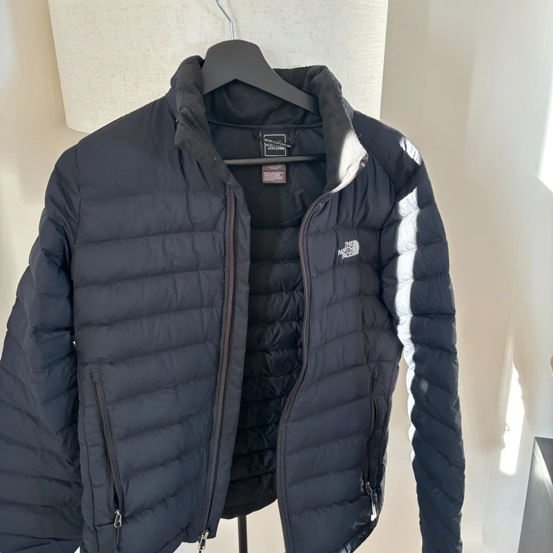 Svart dunjacka från The North Face