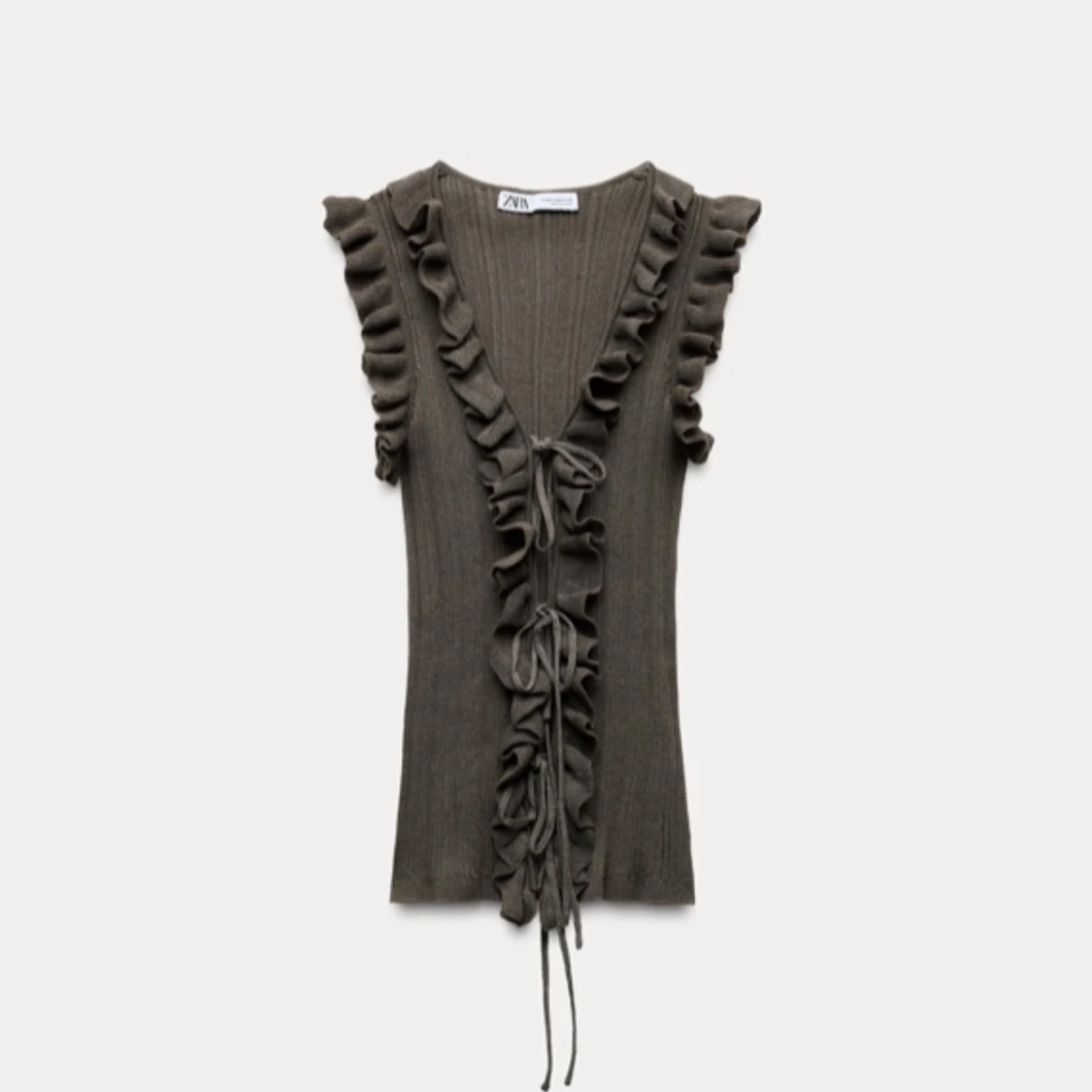 Brun ribbad väst från Zara