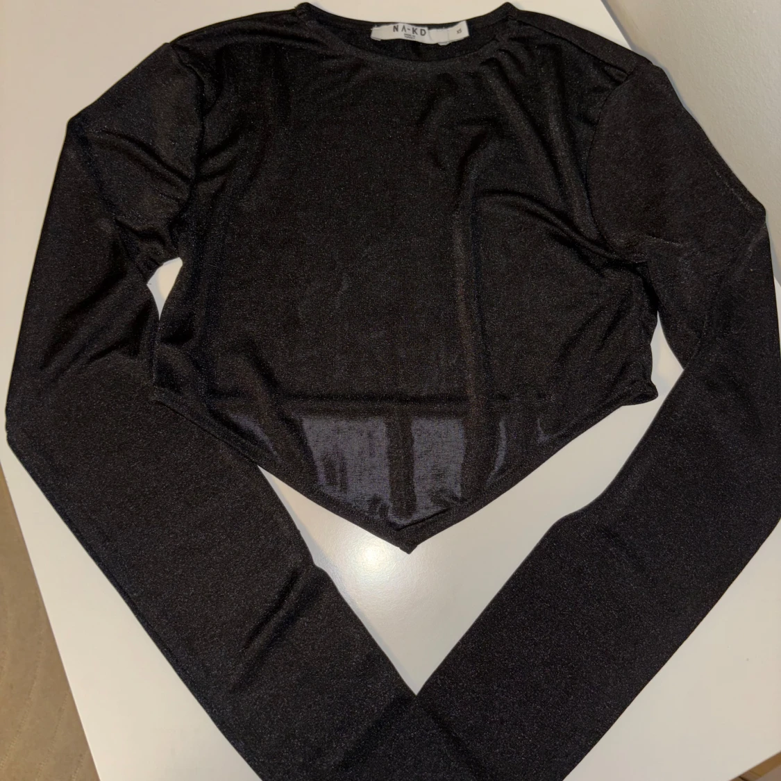 Svart glittrig topp från NA-KD