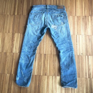 Ljus blå Slim fit polo ralph lauren jeans - RL jeans med riktigt snygg fade och distressing står 32x32 i jeansen men är 31x31