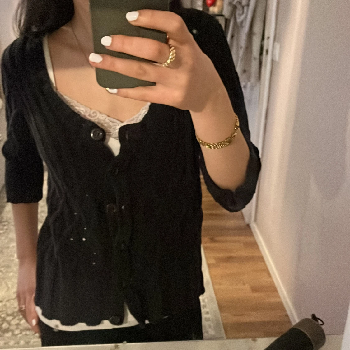 Svart kofta med knappar - 1