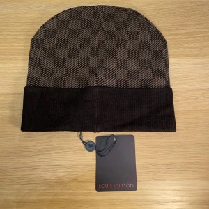 Vinter Mössa - Lou1s Vuitt0n Mössa i nyskick. Pris ej skrivet i sten. 