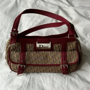 Dior Cloth Handbag - Nyskick.   Dior Bag - Authentic Dior Monogram Columbus Pocket Shoulder Bag   Beige / Red / Silver 12 x 6 inches   Excellent condition with dustbag and authentication card from both Christian Dior and Collector's Cage