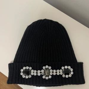 Mössa från Glitter - Mycket bra skick!