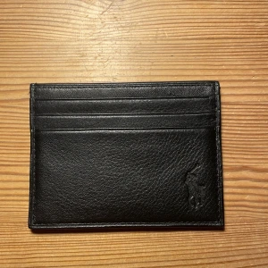 Polo Ralph Lauren plånbok  - Plånbok från Ralph Lauren. Den är nästintill oanvänd.