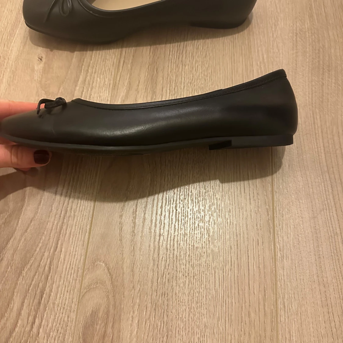 Svarta ballerinaskor med rosett - 91