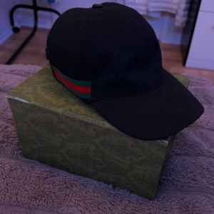 Gucci keps - Fet Gucci keps i bra skick storlek S.