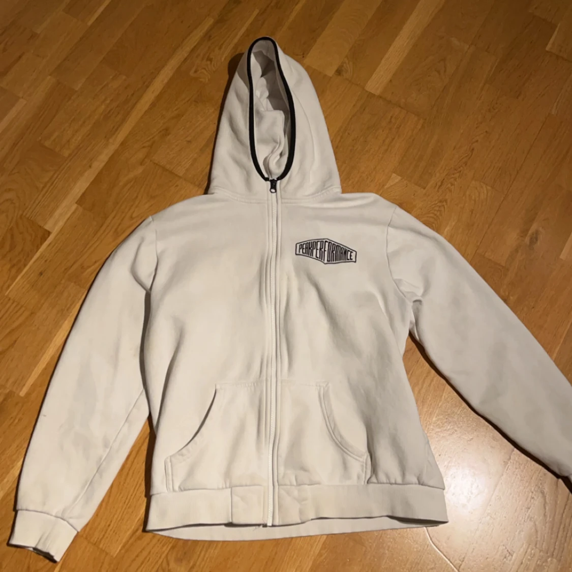 Vit zip hoodie från Peak Performance