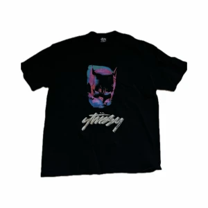 Stussy T-shirt  - Stussy x Batman Dark Knight Rises T-shirt i storlek XL