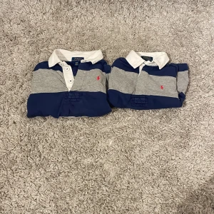 Ralph lauren barn 2 pack  - Hej jag säljer 2st Ralph lauren skjortor. Likadan färg och storlek 2år och storlek 4år. Hör av er om några funderingar.