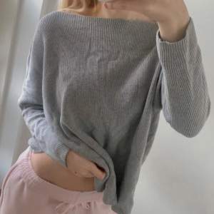 Light, grey sweater with boat neck