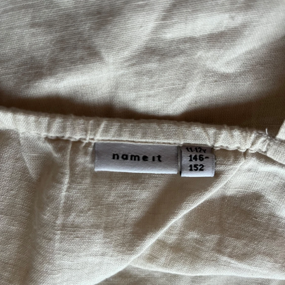 Beige linnetopp från Name It - 91