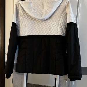 Skidjacka  - Tunnare skidjacka men fodrad. 