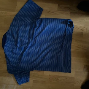Blue striped Nike crew neck t shirts  - Fits little tight for medium, in good condition haven’t worn it super much