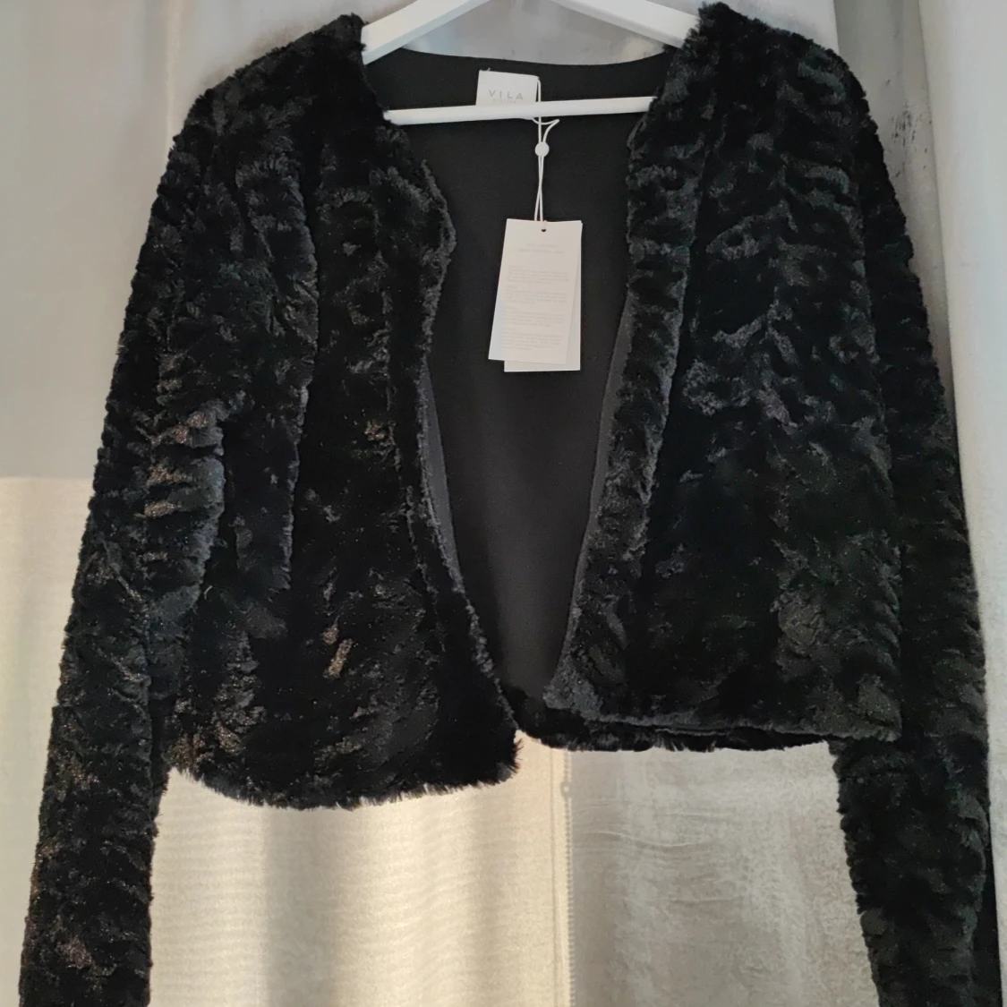 Vila svart jacka, storlek 42