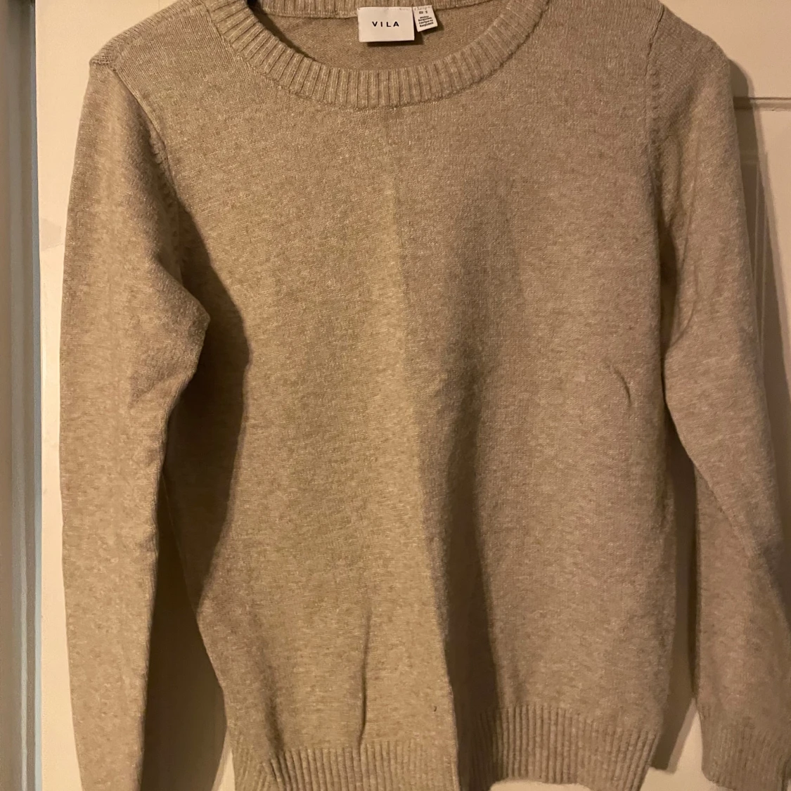 Beige stickad tröja från Vila