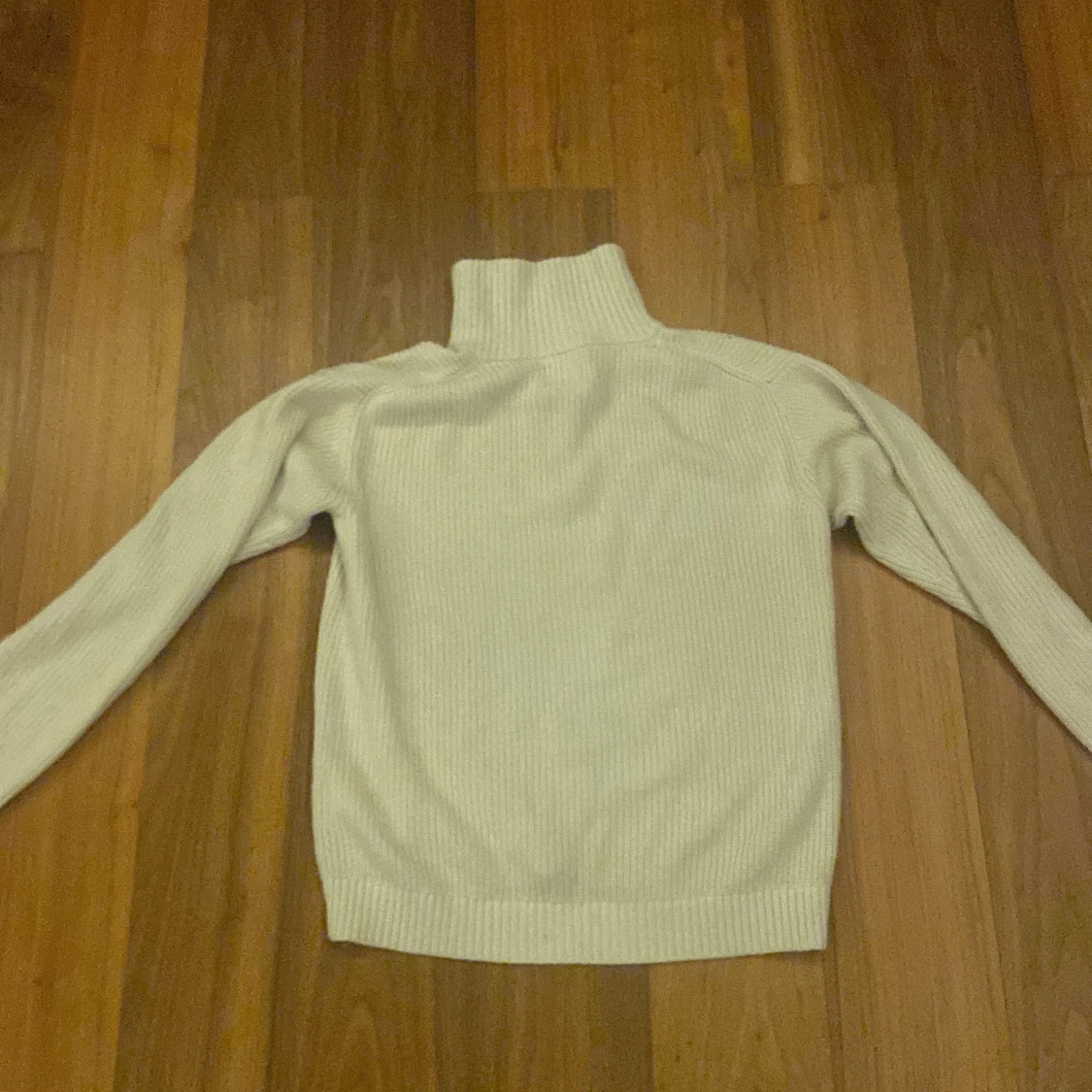 Helt oanvänd Calvin Klein half zip stickad  - 91