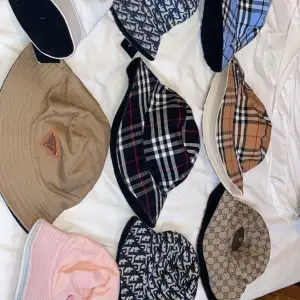  Upptäck tidlös elegans med våra handplockade hattar från lyxmärken som Dior, Gucci, Burberry och Prada. Perfekt kombination av stil och kvalitet  // Bra kopior