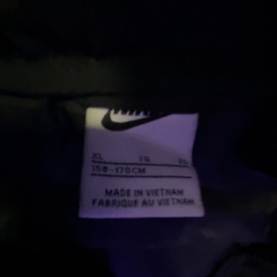 Svart dunjacka från Nike - 1