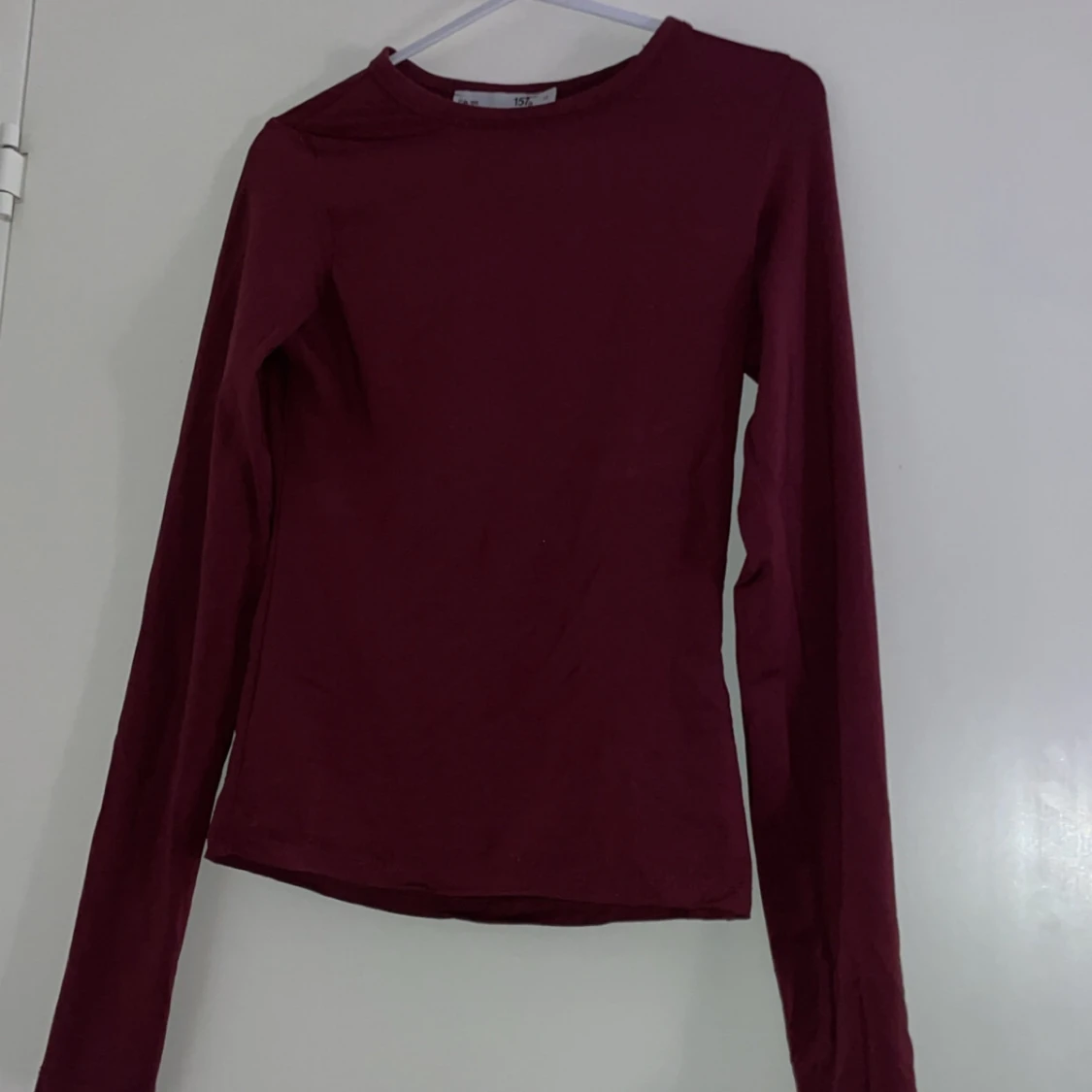 Vinröd långärmad topp från 157 - 1