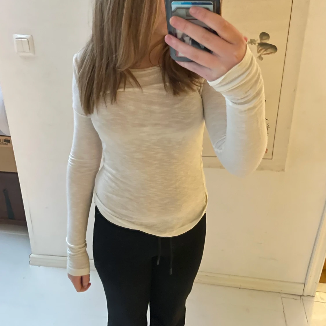 Vit långärmad topp från NLY Trend