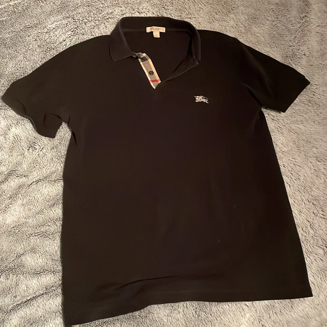 Svart kortärmad pikétröja från Burberry