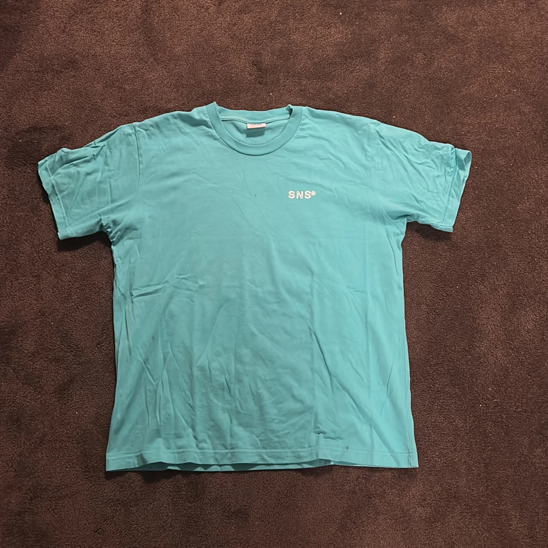 Turkos t-shirt från SNS