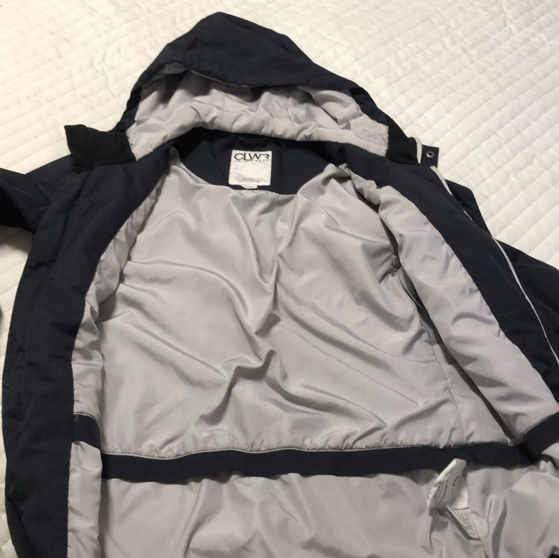 Svart regnjacka från CLWR
